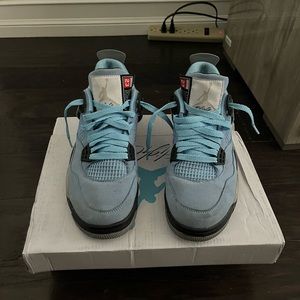 university blue jordan 4